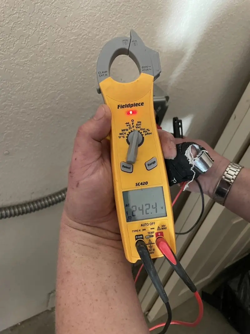 Voltage testing with clamp meter during Hot Tub / Pool Electrical Wiring in Pine Hill